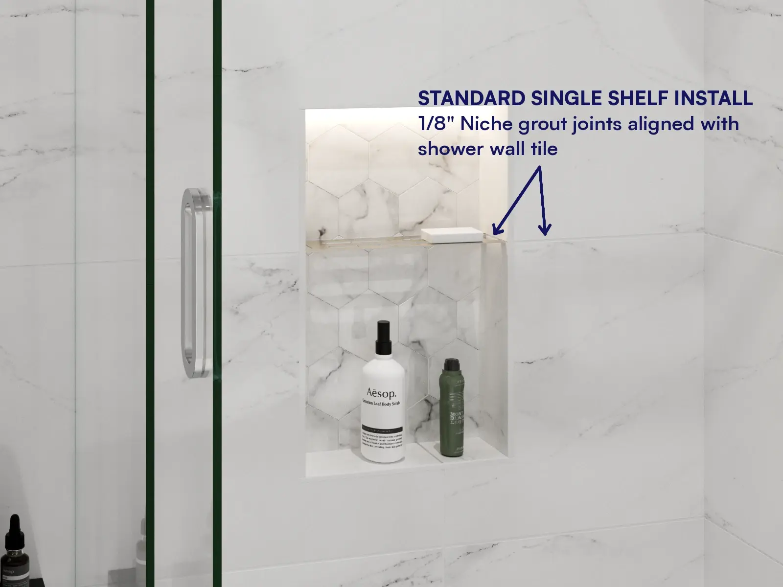 Diagram showing the 3 mm Redblock Rb3m shelf installed in a
                standard 1/8-inch shower niche grout-joint layout.