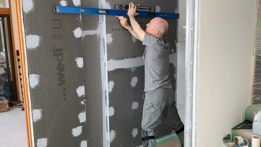 Level reference line for wall tiling -Lay shower tile post