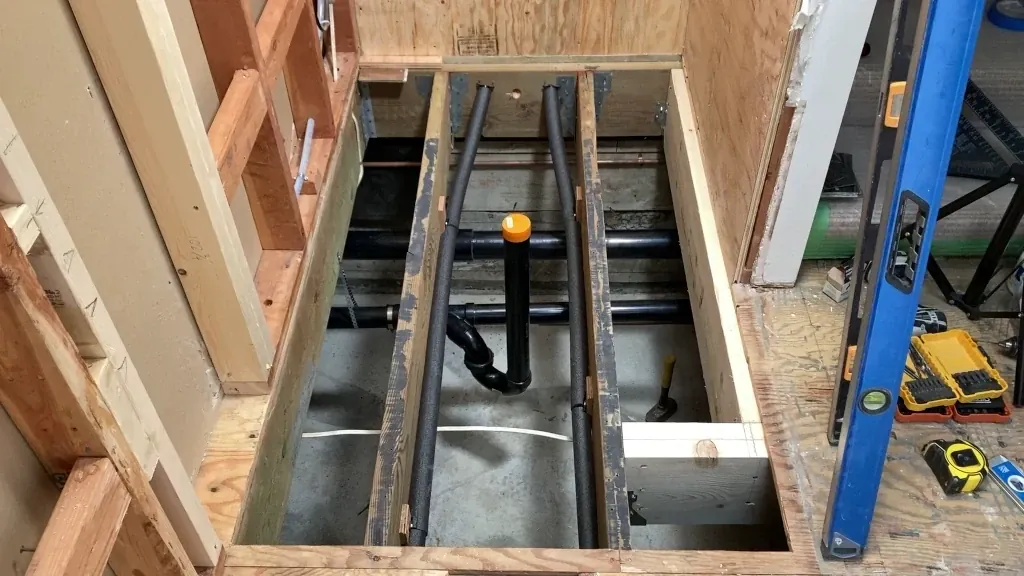 Subfloor joist reinforcement header installed