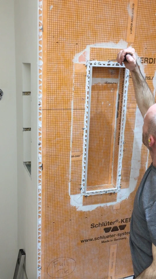 Gluing and screwing on trim - tile edge trim post
