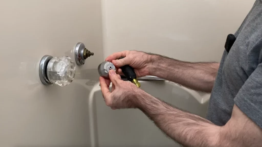 Valve trim removal - removing tile from a bathroom wall post