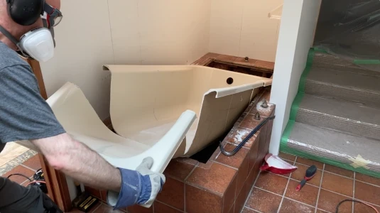 Removing tub in pieces - removing tile from a bathroom wall post