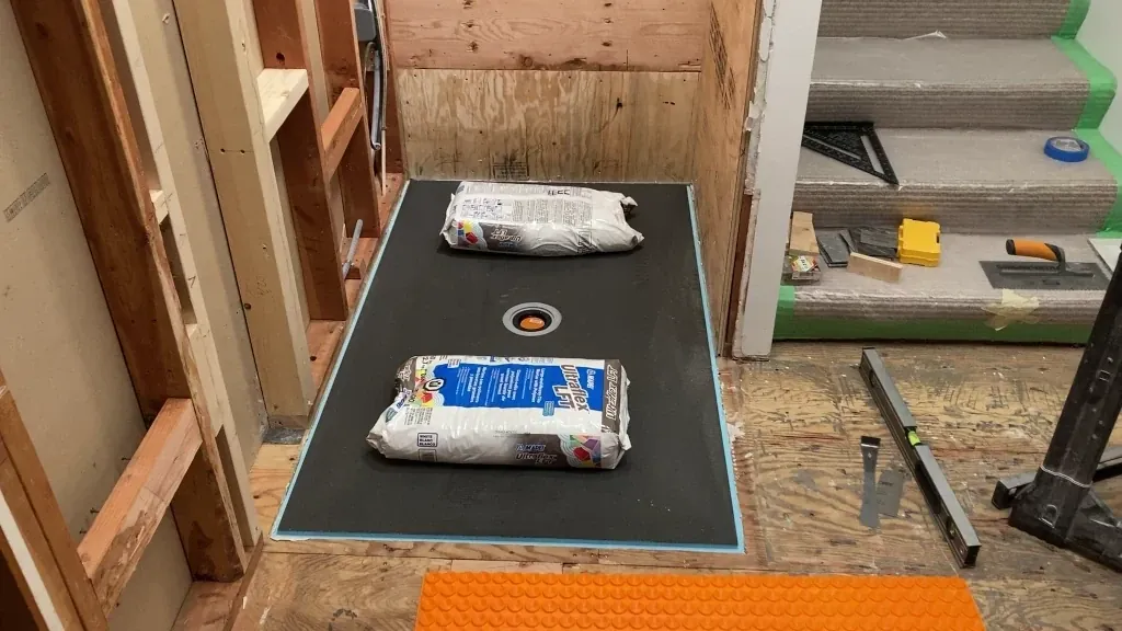 applying weight to pan during mortar setting