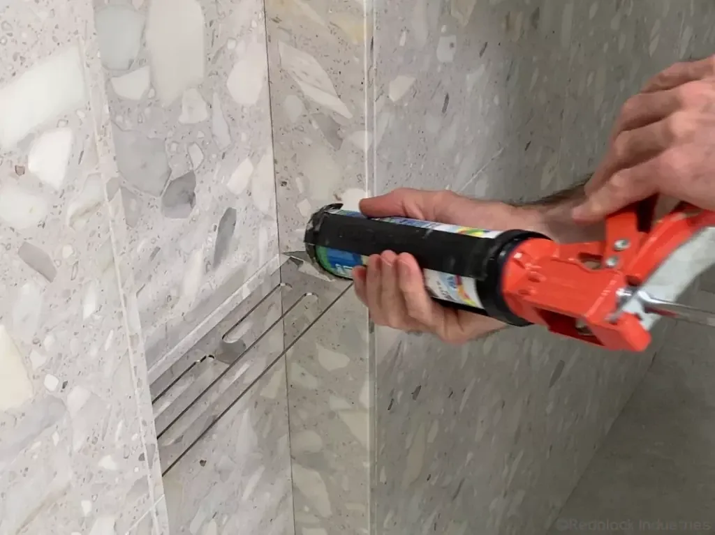 BSN-post-18-caulk-the-niche - how to build a shower niche post