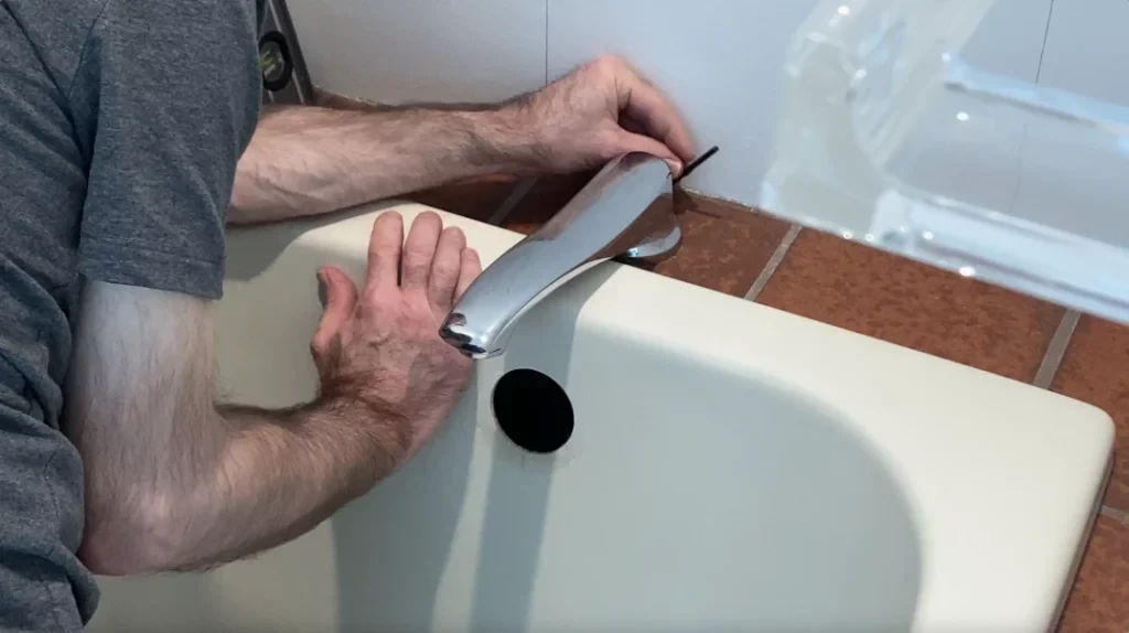 Tub spout removal - Removing tile from a bathroom wall post