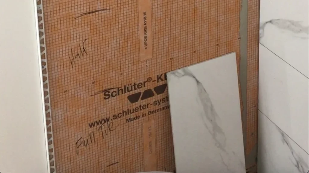 Tile trim first install step -Lay shower tile post