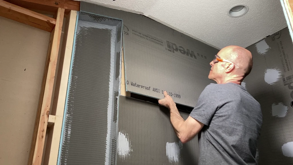 Installing Wedi foam board panels on shower wall