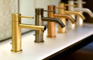 Bathroom vanity faucets in different finishes - stock pic - 300W