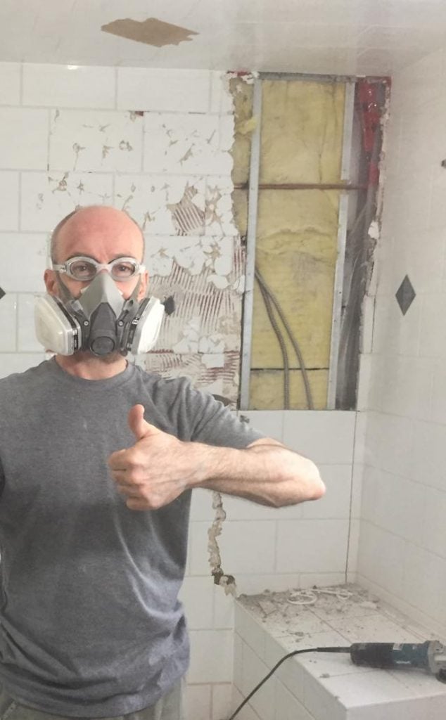 Shower demolition - Steve with thumbs up - Shower Tile Removal
