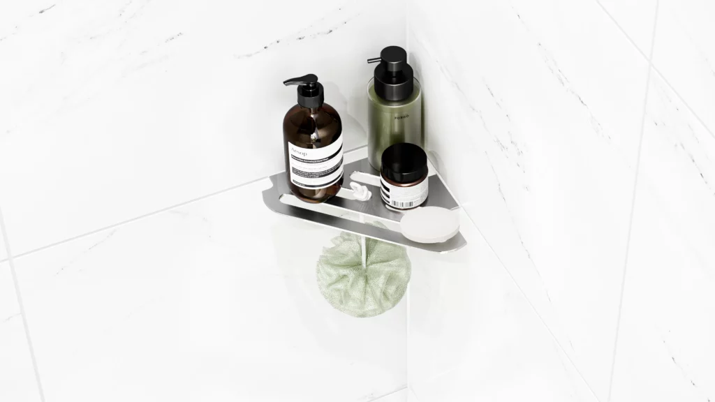 Redblock Corner Shower Shelf mounted with soap, shampoo and puff